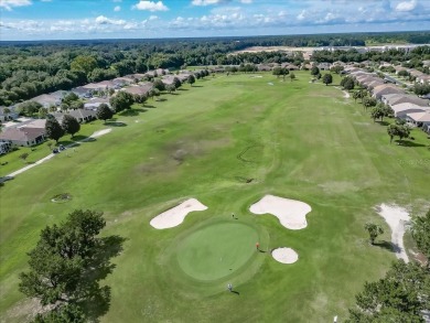 Step inside and be greeted by sweeping golf course views from on Summerglen Country Club in Florida - for sale on GolfHomes.com, golf home, golf lot