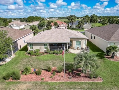 Step inside and be greeted by sweeping golf course views from on Summerglen Country Club in Florida - for sale on GolfHomes.com, golf home, golf lot