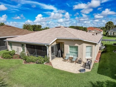 Step inside and be greeted by sweeping golf course views from on Summerglen Country Club in Florida - for sale on GolfHomes.com, golf home, golf lot