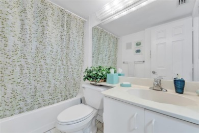 Experience effortless elegance in this first-floor 2-bedroom on Sunrise Lakes Phase IV Golf Course in Florida - for sale on GolfHomes.com, golf home, golf lot