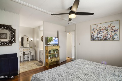 Step inside this mobile home that's been thoughtfully updated on The Refuge Golf and Country Club in Arizona - for sale on GolfHomes.com, golf home, golf lot