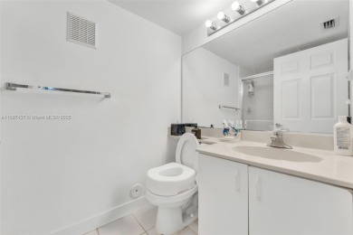 Experience effortless elegance in this first-floor 2-bedroom on Sunrise Lakes Phase IV Golf Course in Florida - for sale on GolfHomes.com, golf home, golf lot