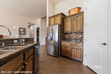 Discover the rare advantage of space and privacy on this on Falcon Ridge Golf Course in Nevada - for sale on GolfHomes.com, golf home, golf lot