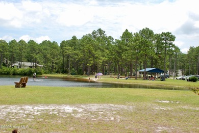 Take a look at this .24-acre wooded lot in the community of on The Lakes Country Club in North Carolina - for sale on GolfHomes.com, golf home, golf lot