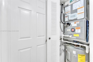 Experience effortless elegance in this first-floor 2-bedroom on Sunrise Lakes Phase IV Golf Course in Florida - for sale on GolfHomes.com, golf home, golf lot