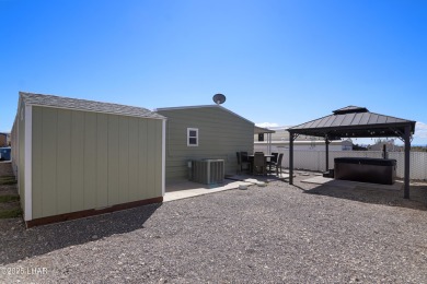 Step inside this mobile home that's been thoughtfully updated on The Refuge Golf and Country Club in Arizona - for sale on GolfHomes.com, golf home, golf lot