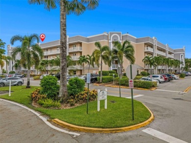Experience effortless elegance in this first-floor 2-bedroom on Sunrise Lakes Phase IV Golf Course in Florida - for sale on GolfHomes.com, golf home, golf lot