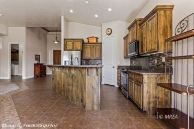 Discover the rare advantage of space and privacy on this on Falcon Ridge Golf Course in Nevada - for sale on GolfHomes.com, golf home, golf lot