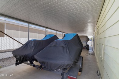 Step inside this mobile home that's been thoughtfully updated on The Refuge Golf and Country Club in Arizona - for sale on GolfHomes.com, golf home, golf lot