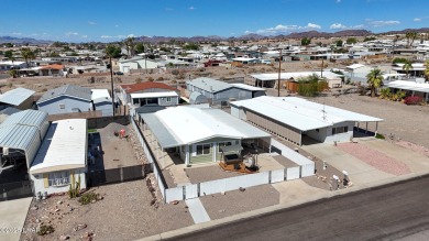 Step inside this mobile home that's been thoughtfully updated on The Refuge Golf and Country Club in Arizona - for sale on GolfHomes.com, golf home, golf lot