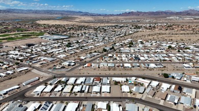 Step inside this mobile home that's been thoughtfully updated on The Refuge Golf and Country Club in Arizona - for sale on GolfHomes.com, golf home, golf lot