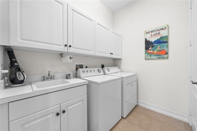 CORNER UNIT -- BEST LOCATION ACROSS FROM POOL + TENNIS COURTS on Oak Harbor Country Club in Florida - for sale on GolfHomes.com, golf home, golf lot