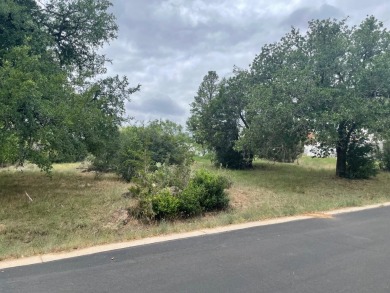 Nice, level Multi-Family lot zoned R-4 in Horseshoe Bay West on Ram Rock Golf Course in Texas - for sale on GolfHomes.com, golf home, golf lot