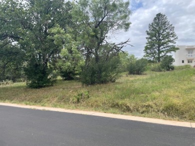 Nice, level Multi-Family lot zoned R-4 in Horseshoe Bay West on Ram Rock Golf Course in Texas - for sale on GolfHomes.com, golf home, golf lot