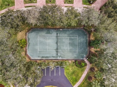 CORNER UNIT -- BEST LOCATION ACROSS FROM POOL + TENNIS COURTS on Oak Harbor Country Club in Florida - for sale on GolfHomes.com, golf home, golf lot