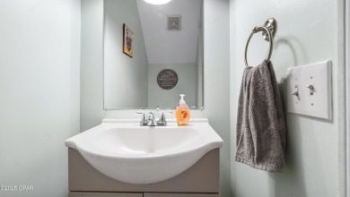 Resort-Style Townhouse with Ensuite Bedrooms, Sunroom & Prime on Edgewater Beach Resort in Florida - for sale on GolfHomes.com, golf home, golf lot