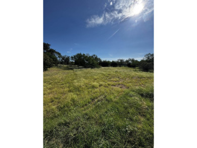 A rare opportunity to own a level lot in upscale Horseshoe Bay on Ram Rock Golf Course in Texas - for sale on GolfHomes.com, golf home, golf lot