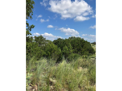 This oversized lot offers elevated views of the surrounding hill on Ram Rock Golf Course in Texas - for sale on GolfHomes.com, golf home, golf lot