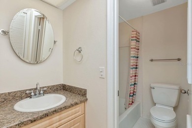 Enjoy the carefree Florida lifestyle in this 2-bedroom, 2-bath on East Lake Woodlands Country Club in Florida - for sale on GolfHomes.com, golf home, golf lot