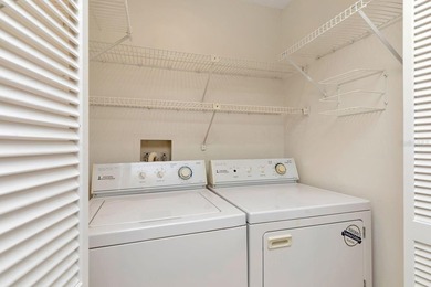 Enjoy the carefree Florida lifestyle in this 2-bedroom, 2-bath on East Lake Woodlands Country Club in Florida - for sale on GolfHomes.com, golf home, golf lot