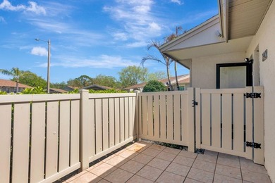 Enjoy the carefree Florida lifestyle in this 2-bedroom, 2-bath on East Lake Woodlands Country Club in Florida - for sale on GolfHomes.com, golf home, golf lot