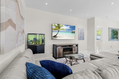 Discover this exceptionally updated single family home situated on Indian Spring Golf and Country Club in Florida - for sale on GolfHomes.com, golf home, golf lot