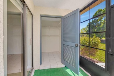 Enjoy the carefree Florida lifestyle in this 2-bedroom, 2-bath on East Lake Woodlands Country Club in Florida - for sale on GolfHomes.com, golf home, golf lot