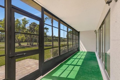 Enjoy the carefree Florida lifestyle in this 2-bedroom, 2-bath on East Lake Woodlands Country Club in Florida - for sale on GolfHomes.com, golf home, golf lot