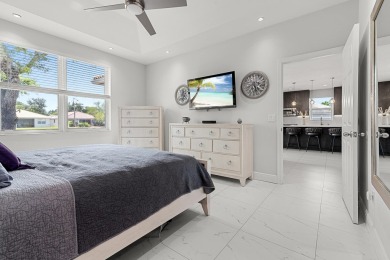 Discover this exceptionally updated single family home situated on Indian Spring Golf and Country Club in Florida - for sale on GolfHomes.com, golf home, golf lot