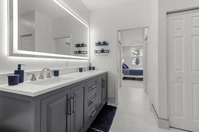 Discover this exceptionally updated single family home situated on Indian Spring Golf and Country Club in Florida - for sale on GolfHomes.com, golf home, golf lot