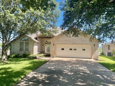 This Meadowlakes home is situated on the Hidden Falls Golf on Hidden Falls Golf Club in Texas - for sale on GolfHomes.com, golf home, golf lot