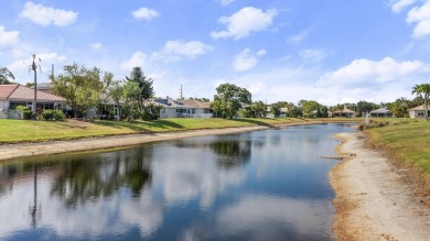 Discover this exceptionally updated single family home situated on Indian Spring Golf and Country Club in Florida - for sale on GolfHomes.com, golf home, golf lot