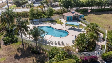 Discover this exceptionally updated single family home situated on Indian Spring Golf and Country Club in Florida - for sale on GolfHomes.com, golf home, golf lot