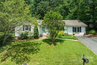 Discover this charming Black Mountain cottage, ideally situated on Black Mountain Golf Course in North Carolina - for sale on GolfHomes.com, golf home, golf lot