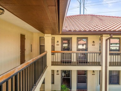Gorgeous Hammock Pines Village second floor condo with one on Countryside Country Club in Florida - for sale on GolfHomes.com, golf home, golf lot