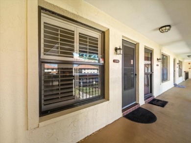 Gorgeous Hammock Pines Village second floor condo with one on Countryside Country Club in Florida - for sale on GolfHomes.com, golf home, golf lot