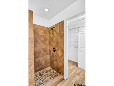 Welcome to your serene retreat in the gated community of on Hide-A-Way Lake Golf Course in Texas - for sale on GolfHomes.com, golf home, golf lot