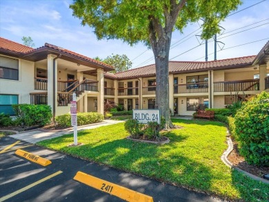 Gorgeous Hammock Pines Village second floor condo with one on Countryside Country Club in Florida - for sale on GolfHomes.com, golf home, golf lot