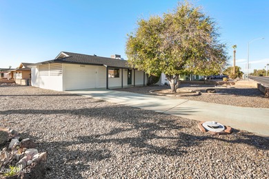 Looking for a HUGE lot? Welcome to this upgraded 2-bedroom on Sun City Lakes West and East in Arizona - for sale on GolfHomes.com, golf home, golf lot