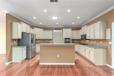 This beautiful home is the Huntley 11 EXP Model with 2635 SQ FT on Candler Hills Golf and Country Club in Florida - for sale on GolfHomes.com, golf home, golf lot