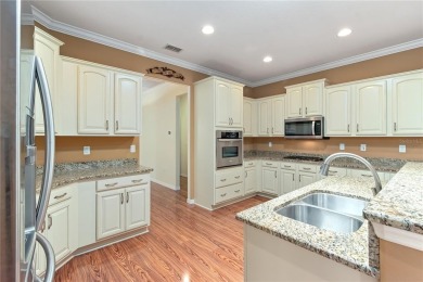 This beautiful home is the Huntley 11 EXP Model with 2635 SQ FT on Candler Hills Golf and Country Club in Florida - for sale on GolfHomes.com, golf home, golf lot