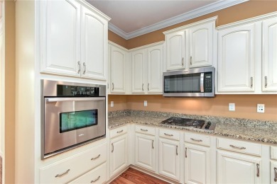 This beautiful home is the Huntley 11 EXP Model with 2635 SQ FT on Candler Hills Golf and Country Club in Florida - for sale on GolfHomes.com, golf home, golf lot