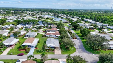 This open and spacious 2 bdrm/ 2 bath home features laminate & on Savanna Golf Club in Florida - for sale on GolfHomes.com, golf home, golf lot