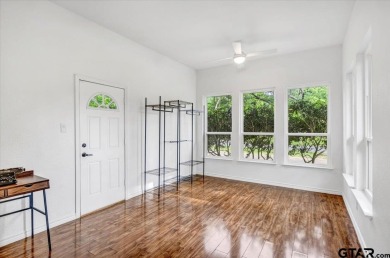 Welcome to your serene retreat in the gated community of on Hide-A-Way Lake Golf Course in Texas - for sale on GolfHomes.com, golf home, golf lot