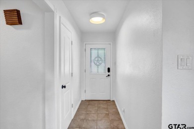 Welcome to your serene retreat in the gated community of on Hide-A-Way Lake Golf Course in Texas - for sale on GolfHomes.com, golf home, golf lot
