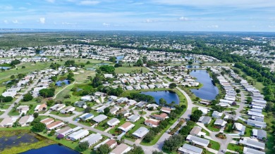 This open and spacious 2 bdrm/ 2 bath home features laminate & on Savanna Golf Club in Florida - for sale on GolfHomes.com, golf home, golf lot