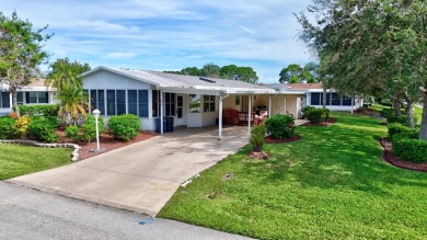 This open and spacious 2 bdrm/ 2 bath home features laminate & on Savanna Golf Club in Florida - for sale on GolfHomes.com, golf home, golf lot