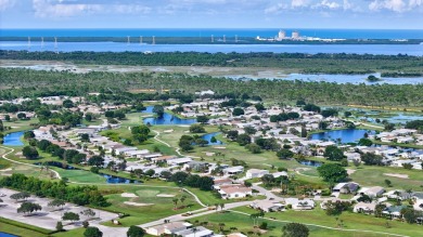 This open and spacious 2 bdrm/ 2 bath home features laminate & on Savanna Golf Club in Florida - for sale on GolfHomes.com, golf home, golf lot