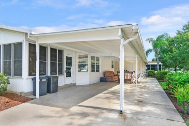 This open and spacious 2 bdrm/ 2 bath home features laminate & on Savanna Golf Club in Florida - for sale on GolfHomes.com, golf home, golf lot