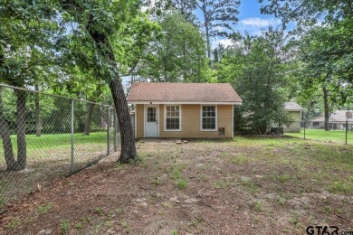 Welcome to your serene retreat in the gated community of on Hide-A-Way Lake Golf Course in Texas - for sale on GolfHomes.com, golf home, golf lot